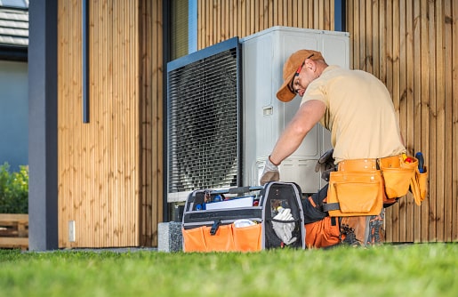 HVAC Technician Repairing Outdoor Heat Pump Unit in Hunterdon County, NJ